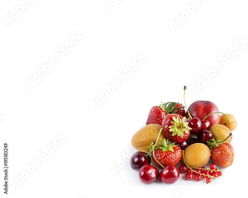 Mix berries and fruits isolated on white. Berries and fruits with copy space for text. Ripe strawberries, currants, cherries, apricots and peaches isolated on white background. 