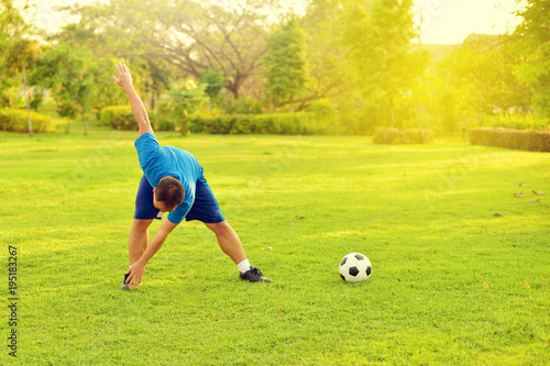 Asian man exercise in garden 