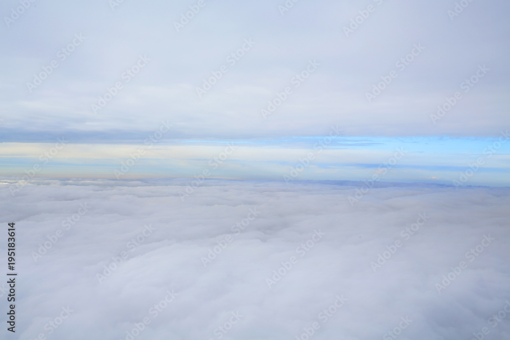 peak view: half foggy ground and half cloudy sky