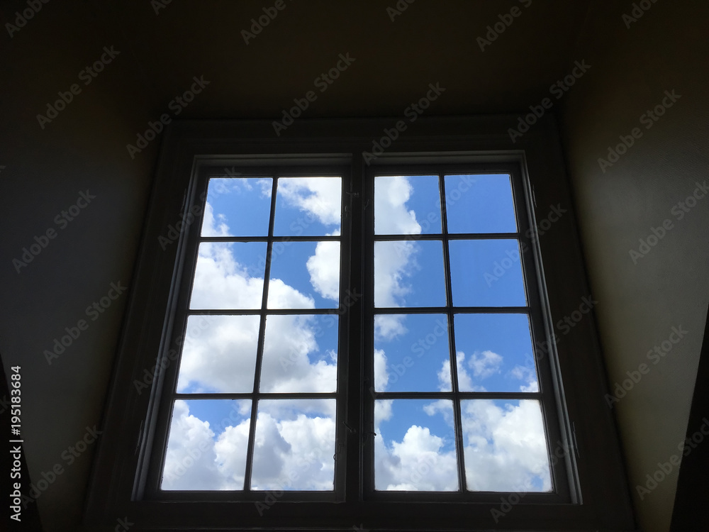 Window with blue skies Window with blue skies