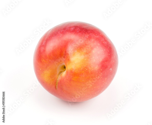 One plum red orange isolated on white background fresh and glossy.