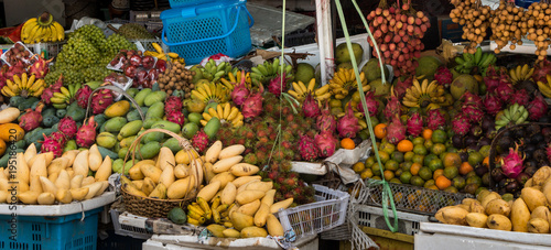 Exotic fruit display at local market in Asia