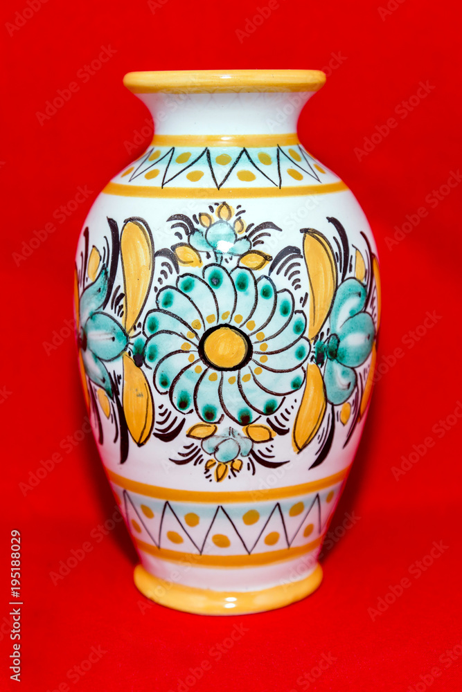 Fragile vase for flowers on a bright red background
Fragile vase for flowers on a bright red background