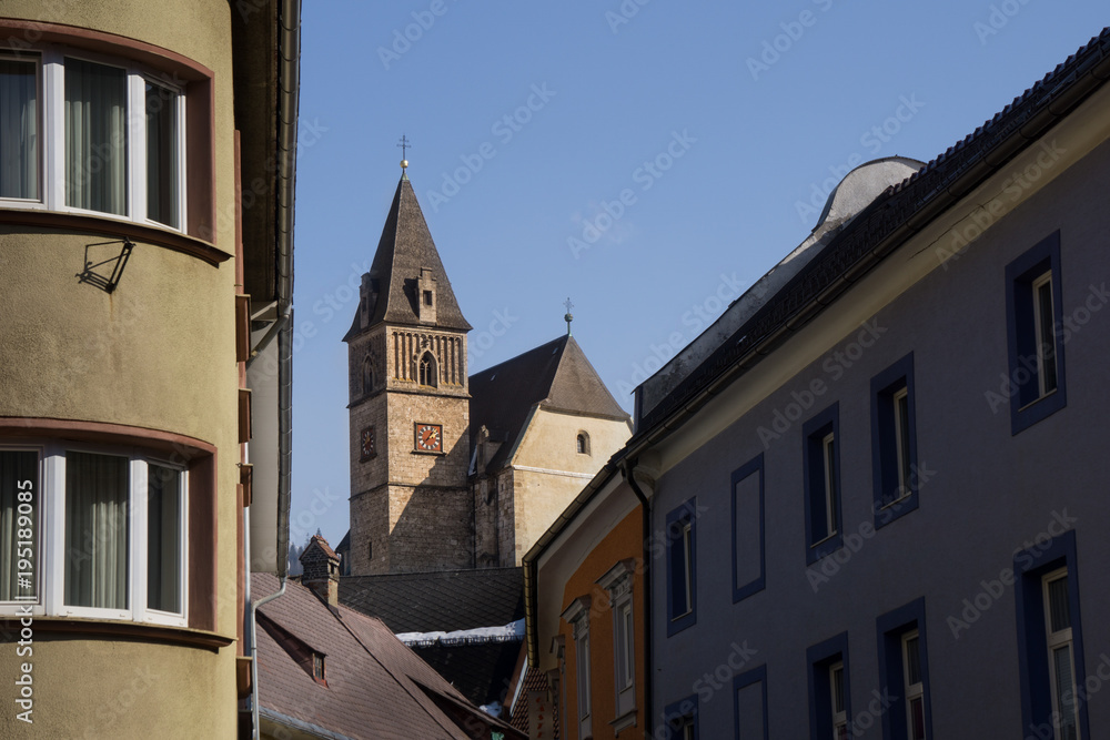 The St. Oswald church tower seen from downtown Eisenerz