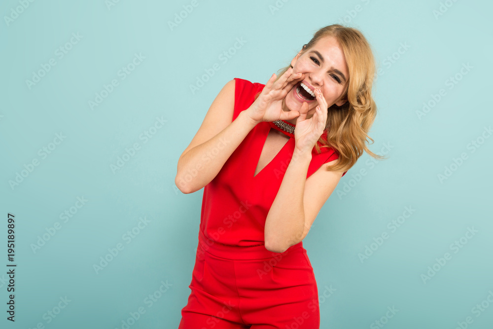 Attractive blonde woman in red overalls Attractive blonde woman in red overalls