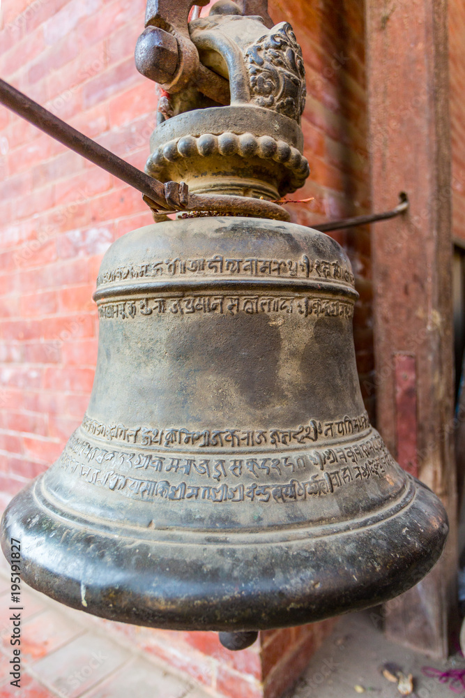 Fototapeta premium Bell Hanging from a Beam