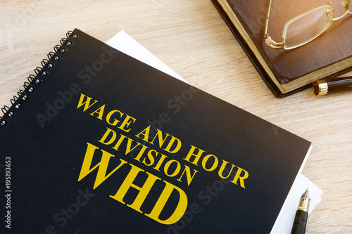 фотографія Book with name Wage and Hour Division (WHD).