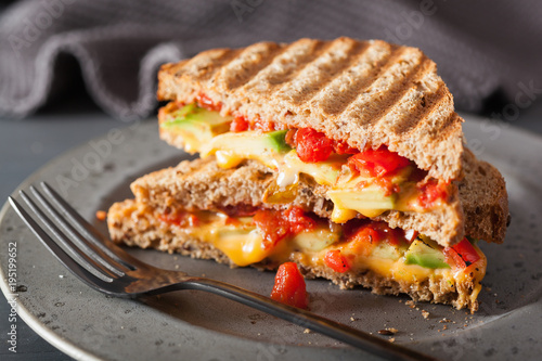 grilled cheese sandwich with avocado and tomato