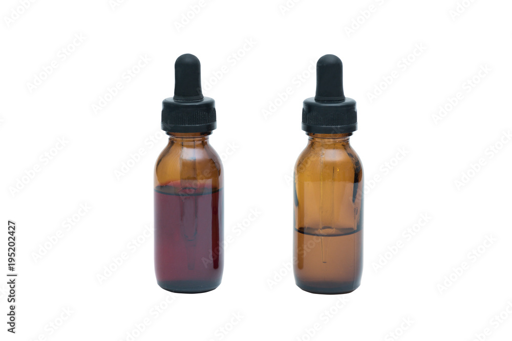 Universal indicator and Phenolphthalein solutions, the pH indicator in the brown glass bottle with dropper  isolated on white background with clipping path