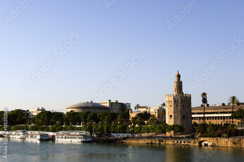 Panoramic view of Seville riverbank with the Torre del Oro