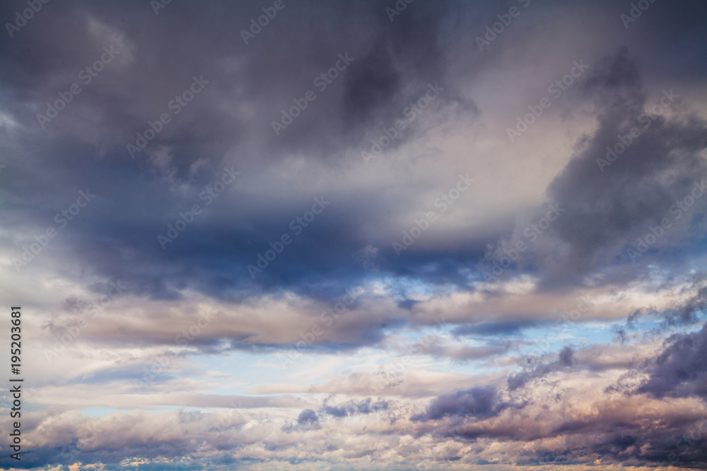 Obraz premium Blue sky with gray clouds