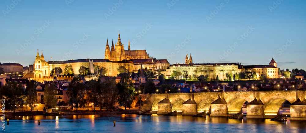 Panorama of Prague castle and Charles bridge by night, Czech republic