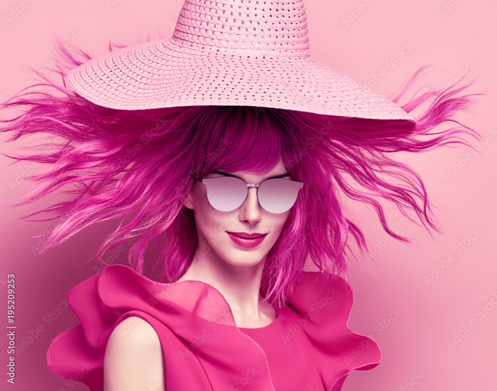 Glamour Beautiful Lady Smiling. Party fashionable Hairstyle. Fashion woman in pink Summer Dress. Young Playful female model in Stylish fashion Hat. Trendy Sunglasses Glamour Beautiful Lady Smiling. Party fashionable Hairstyle. Fashion woman in pink Summer Dress. Young Playful female model in Stylish fashion Hat. Trendy Sunglasses