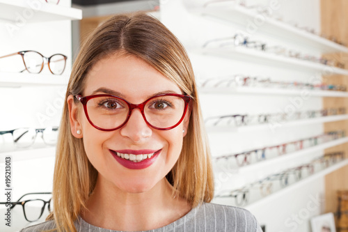 Woman choosing eyeglass frame