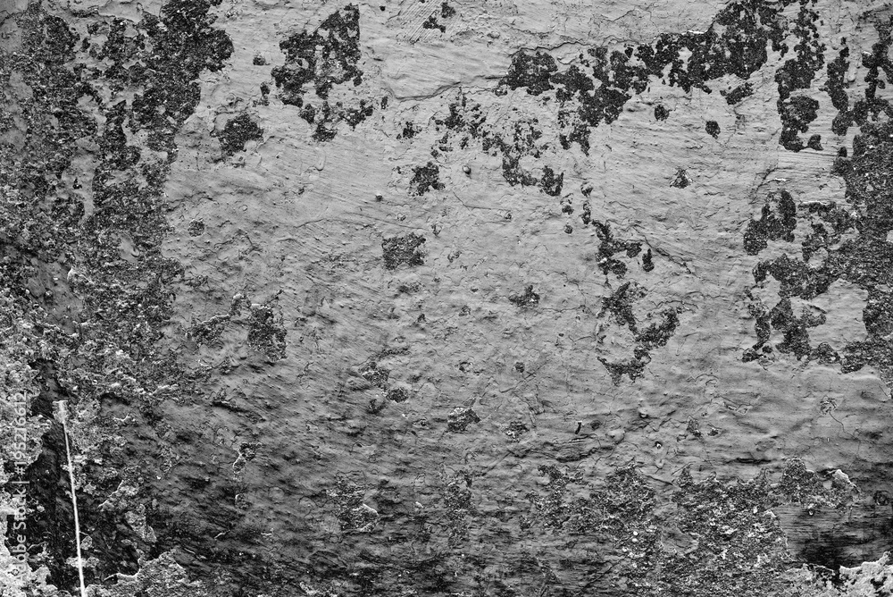 Fototapeta premium Wall fragment with scratches and cracks