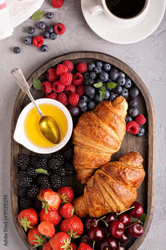 Croissants with fresh berry and honey