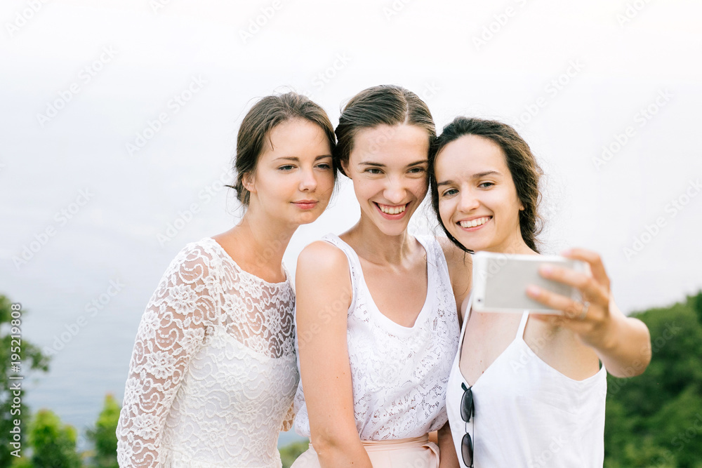 Charming women taking selfie Charming women taking selfie