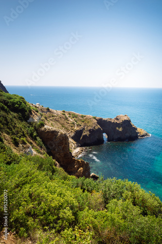 Amazing view on sea and mountains in the distance in hot summer. Vacation, summer travel. Black sea, seacoast. Crimea.