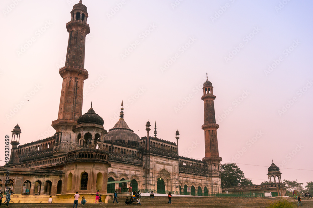 Lucknow, India: 3rd Feb 2018: The entrance and gardens of the bara imambara. The spires and dome of the main building and the beautiful well maintained grounds make this a famous tourist spot.