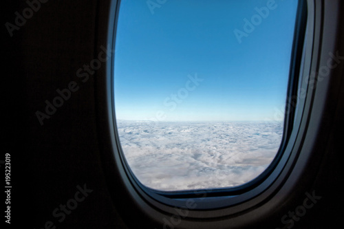 blue sky outside airplane window