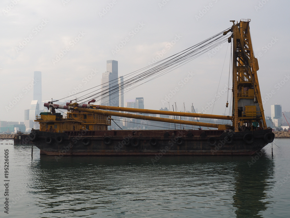 A derrick ship in the Hong Kong harbor.