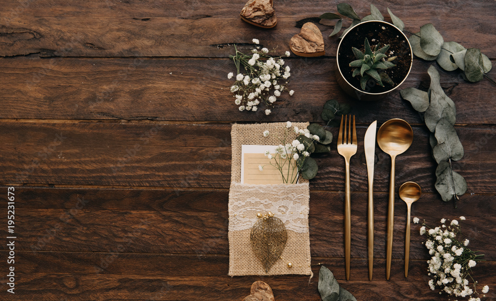 Wedding concept. Rustic table set over wooden background. Boho style, top view, flat lay Wedding concept. Rustic table set over wooden background. Boho style, top view, flat lay