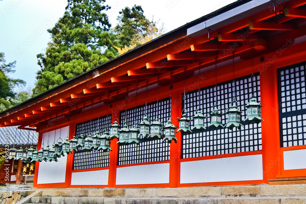 beautiful red temple and bronze lanterns in shinto shrine nara japan beautiful red temple and bronze lanterns in shinto shrine nara japan