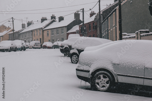 Принти на полотні Rural setting in the village of Carrignavar after Storm Emma, also known as the Beast from the East, which hit Ireland at the start of March: white roads and cars still covered in snow