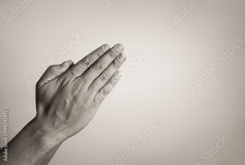 Closeup of hand praying. 