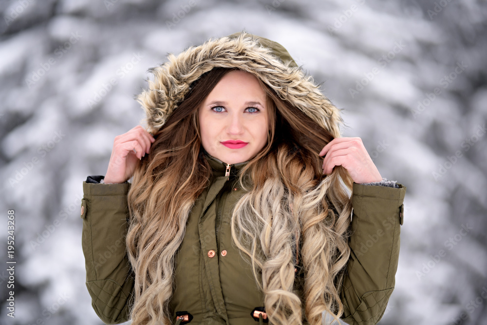 Portrait of happy young woman have fun at beautiful winter day Portrait of happy young woman have fun at beautiful winter day