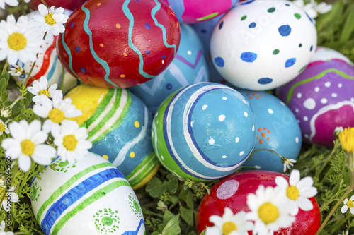 Colorful easter eggs on grass