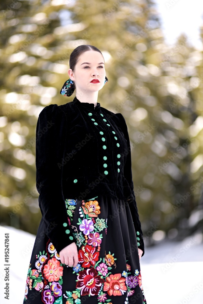 Girl dressed in traditional Slovak folk costume Girl dressed in traditional Slovak folk costume