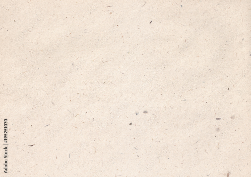 texture of light kraft paper sheet with soft dark brown grain shavings texture of light kraft paper sheet with soft dark brown grain shavings