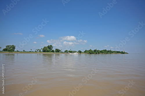 Fototapeta Naklejka Na Ścianę i Meble -  A sunny riverside of the Irrawaddy in Myanmar