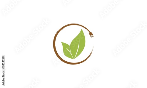 Healthy food logo. concept logo, with the symbol of a spoon, fork and leaf. cutlery and leaf vector design for icon, symbol or logo. vegan template logo