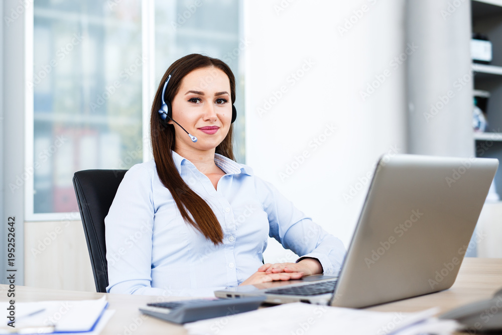 Beautiful young woman working at call center Beautiful young woman working at call center