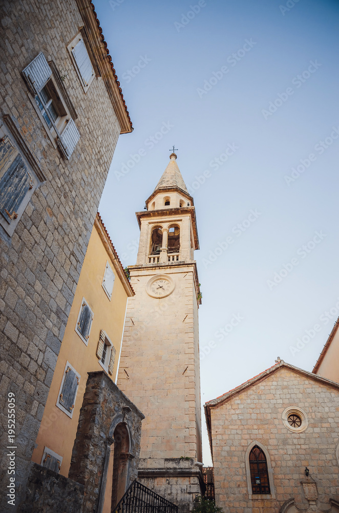Fototapeta premium Narrow street in old district of Budva, Montenegro