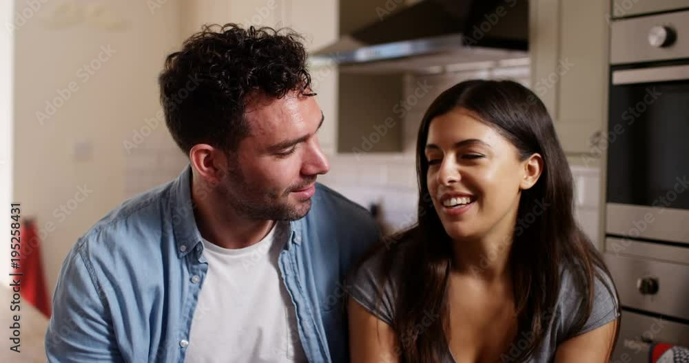 4K Cheerful couple making a video call at home, seen from webcam's pov 4K Cheerful couple making a video call at home, seen from webcam's pov