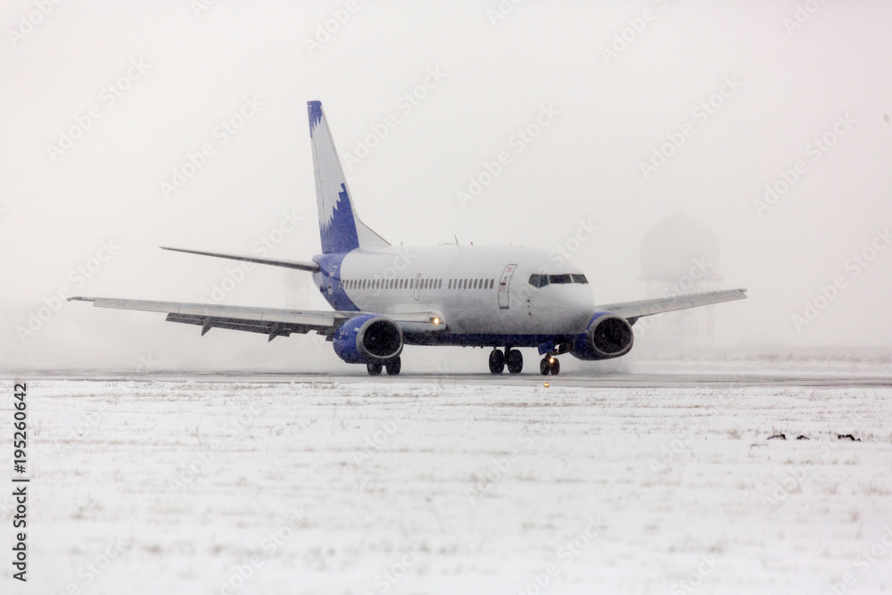 Snow On The Runway With Airplane