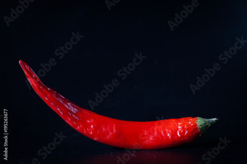 Red fresh bitter chili pepper isolated on white background