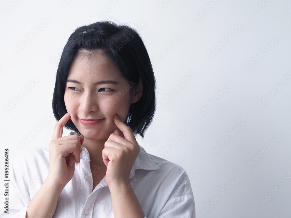 Happy Young Asian woman standing over white background. Happy Young Asian woman standing over white background.