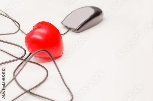 Click on the computer mouse to check, open, discover or unlock what is inside the heart. Healthcare checkup or finding heart, love secret emotion concept.