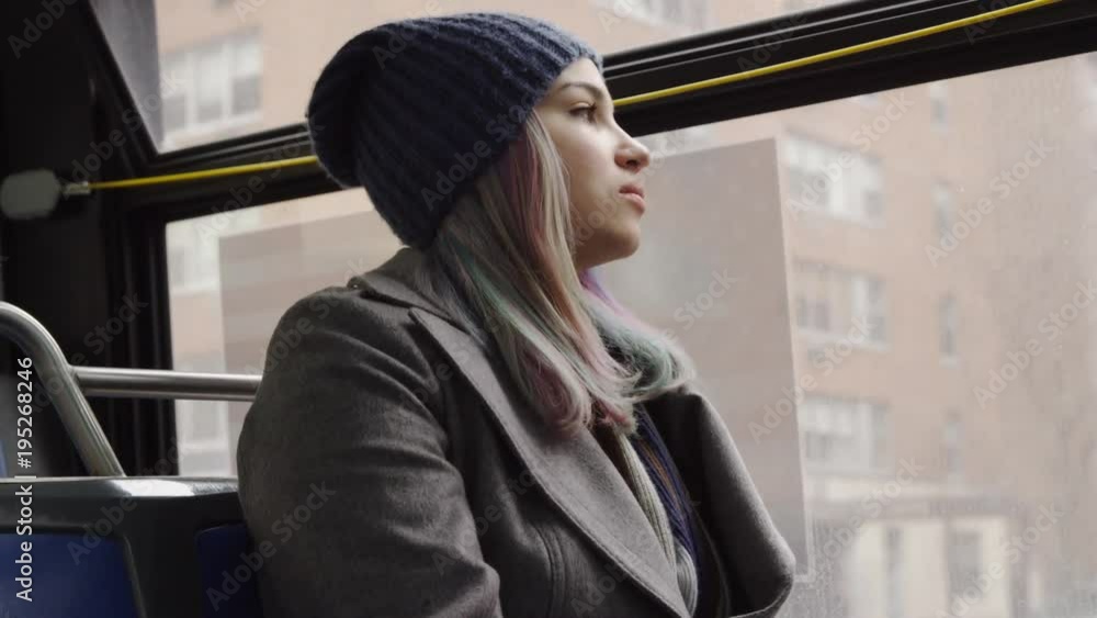 beautiful woman riding bus alone - tourist on public transportation - looking out window at New York City in cold winter - 4K and 1080 HD in NYC beautiful woman riding bus alone - tourist on public transportation - looking out window at New York City in cold winter - 4K and 1080 HD in NYC