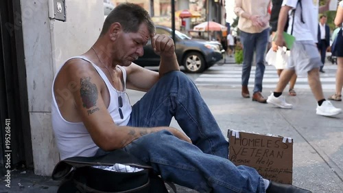 homeless veteran with sign looking for help in summer New York City NYC 1080 HD