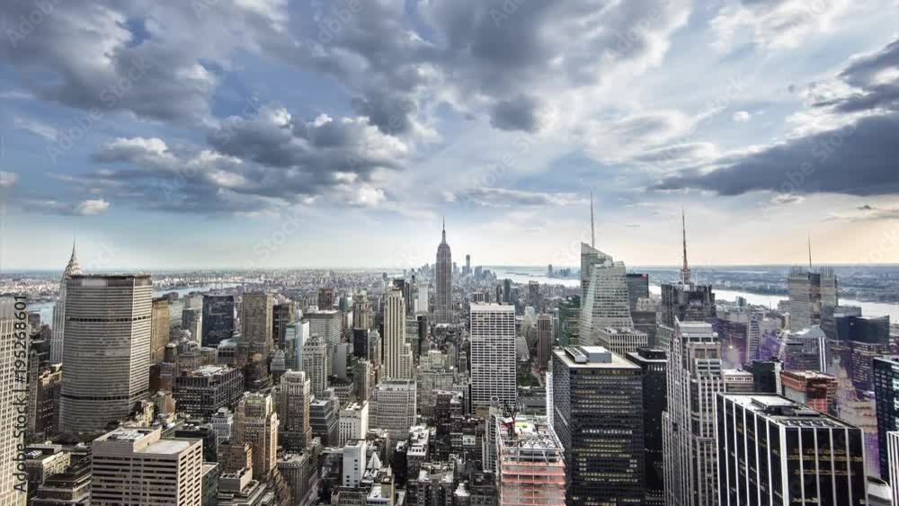 Manhattan cityscape timelapse day to night with Empire State Building and landmark skyscrapers and buildings 4K and 1080 HD
