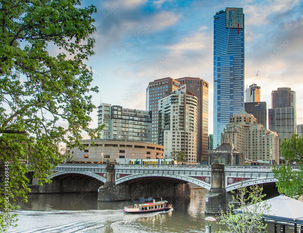 Boat passing under Princes Bridge