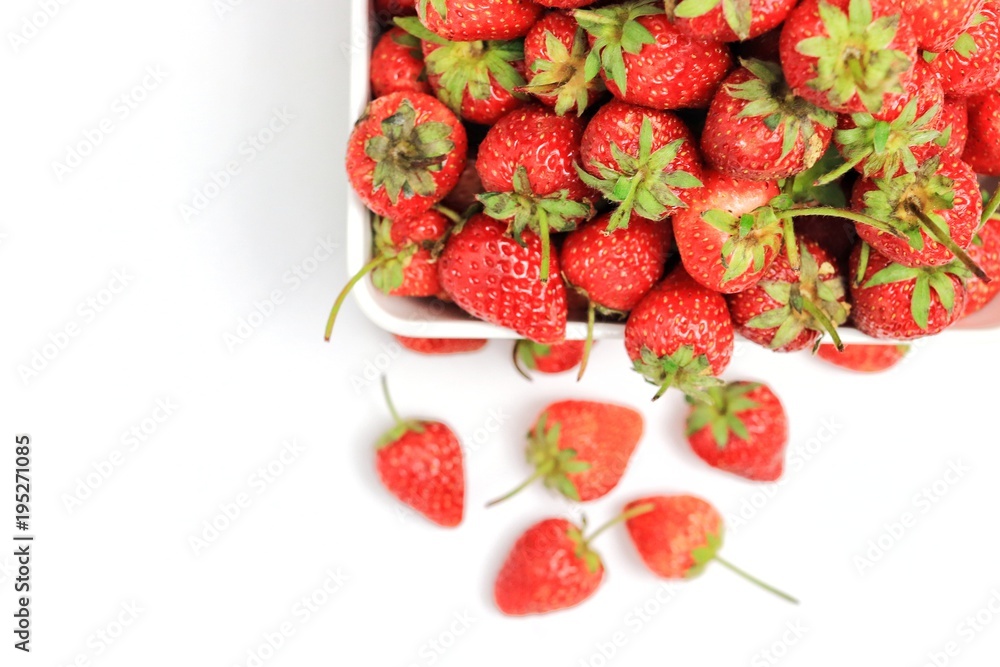 Red strawberry, closeup, macro On a white background Red strawberry, closeup, macro On a white background