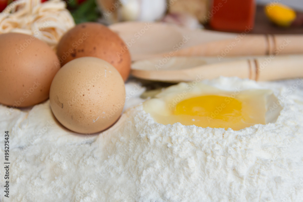 ingredients preparation spaghetti with eggs, tomatoes herbs and spices ingredients preparation spaghetti with eggs, tomatoes herbs and spices
