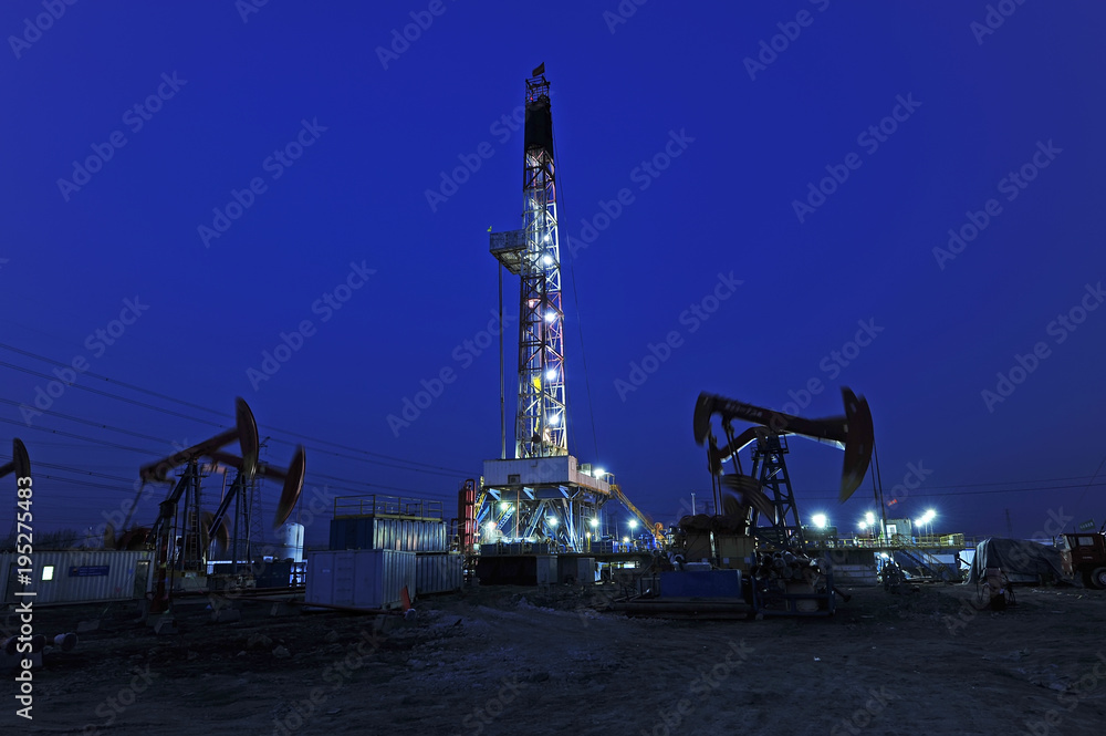 Oil drilling rig in the evening Oil drilling rig in the evening