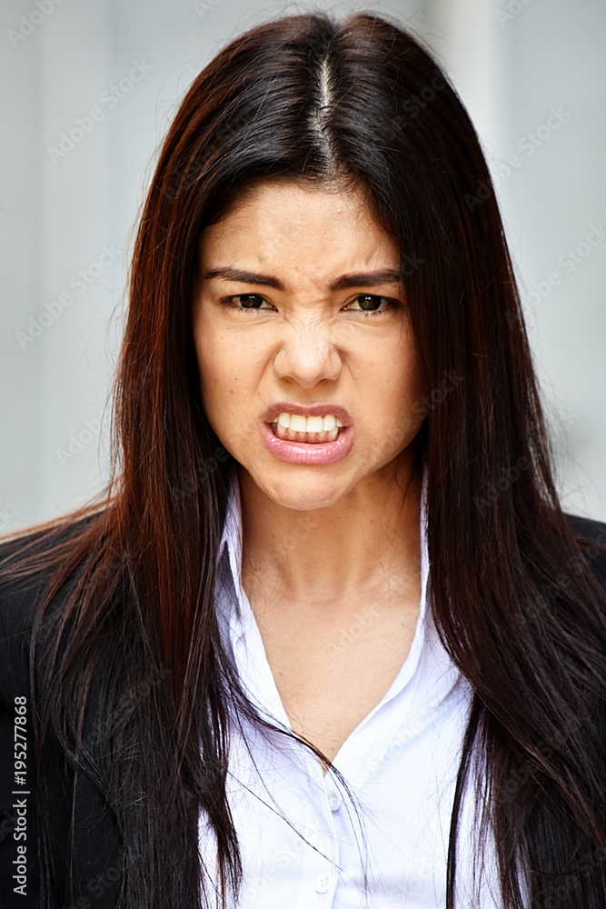 Stressful Hispanic Business Woman Wearing Suit Stressful Hispanic Business Woman Wearing Suit